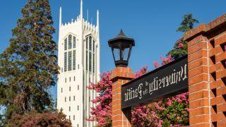 University of the Pacific sign with Burns Tower in the background